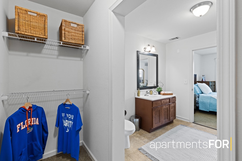 a bathroom with a mirror and a toilet