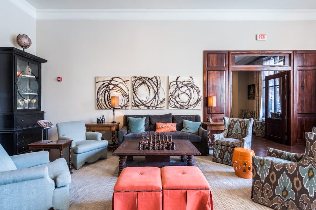 a room with a chess board and chairs