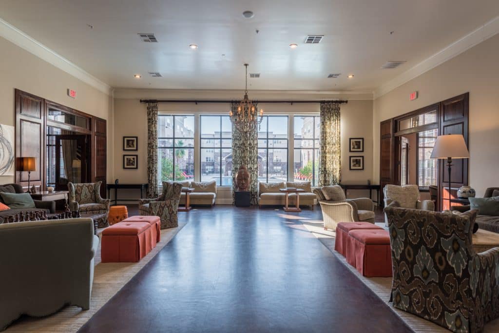 a room with couches and chairs