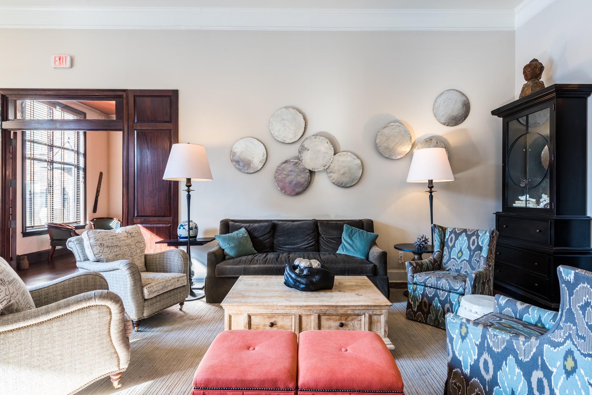 a room with couches and chairs