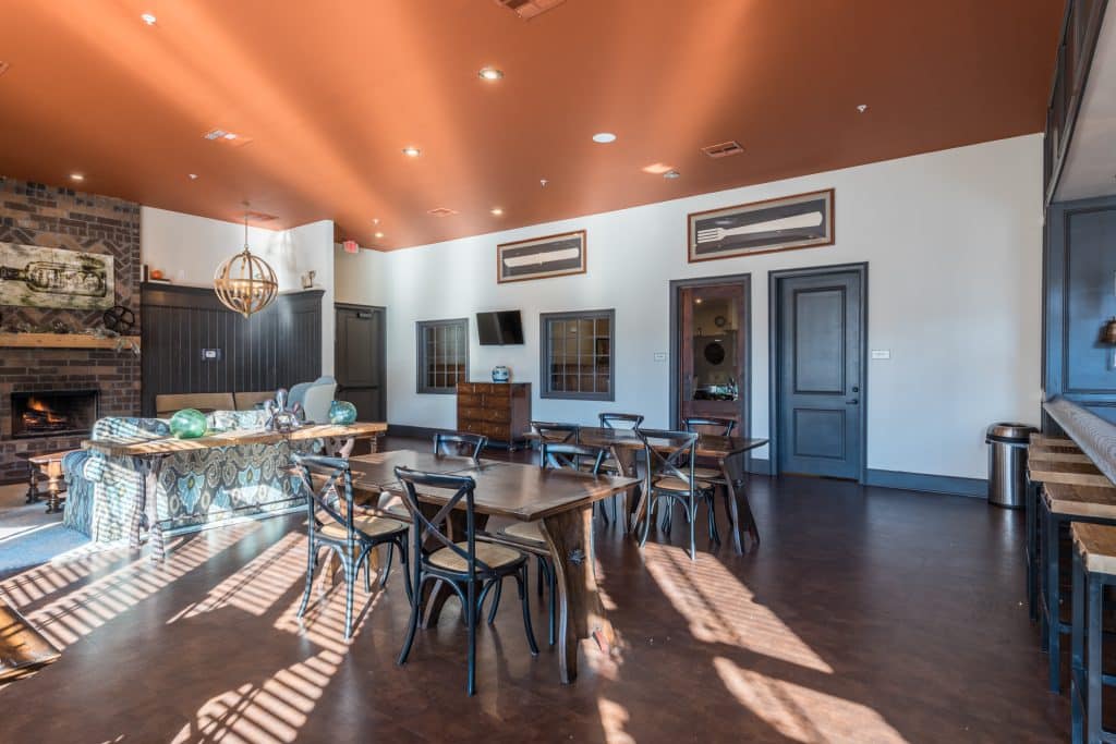 a room with a table and chairs